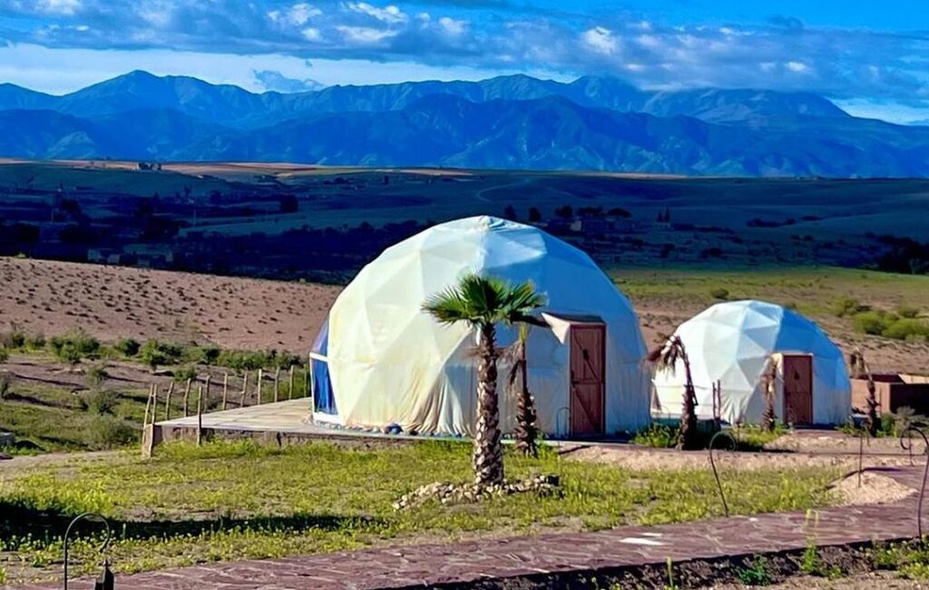 Glamping domes beneath the Atlas at golden hour