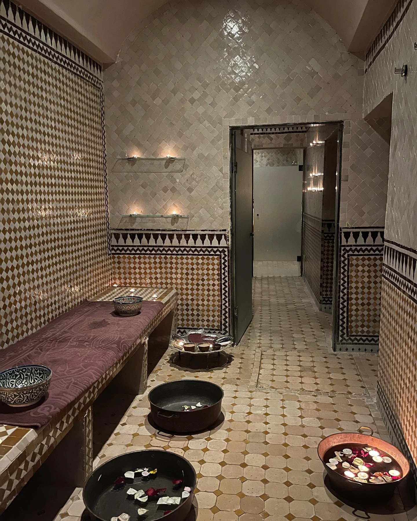 The hammam ritual — steam, black soap, rose water — the staged pause a luxury itinerary builds in